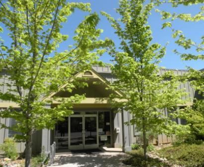 Crown Point Front Entrance with trees on either side