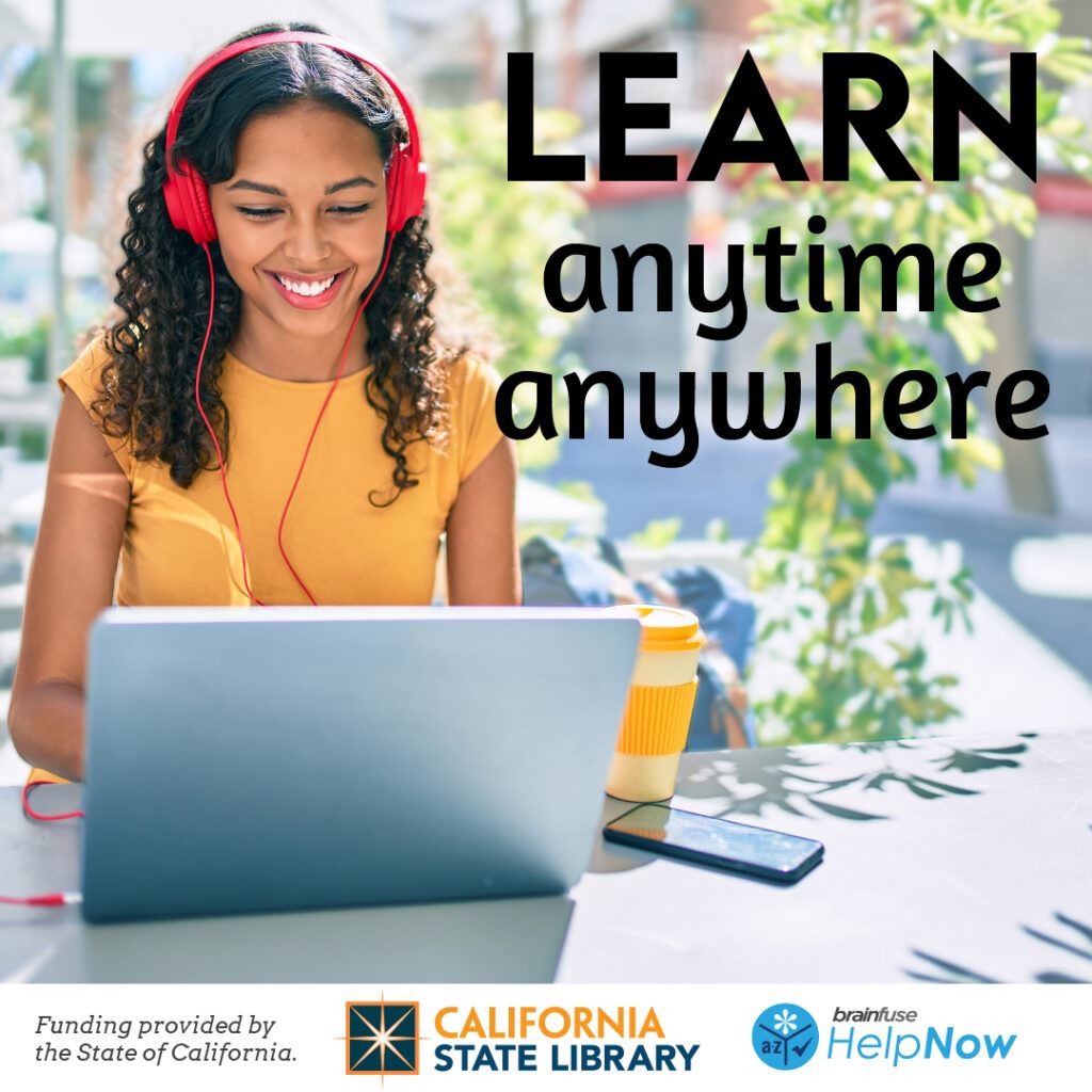 Photo of girl with laptop wearing headphones