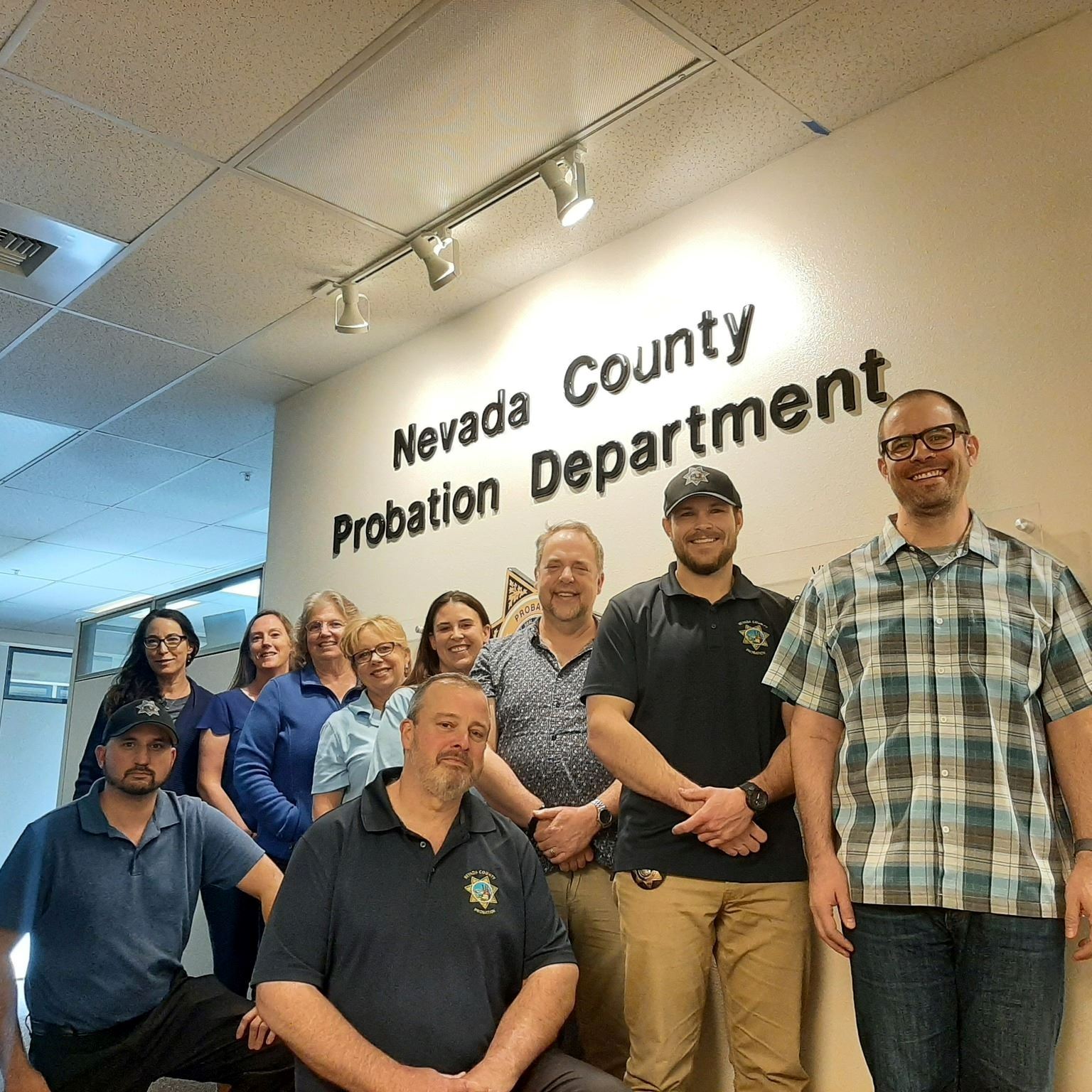 A group of Nevada County Probation staff wear blue to support Child Abuse and Neglect Prevention Mon
