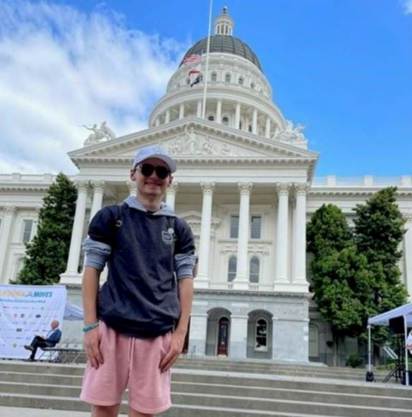 Maddux Eckerling stands outside of the state capitol building in Sacramento