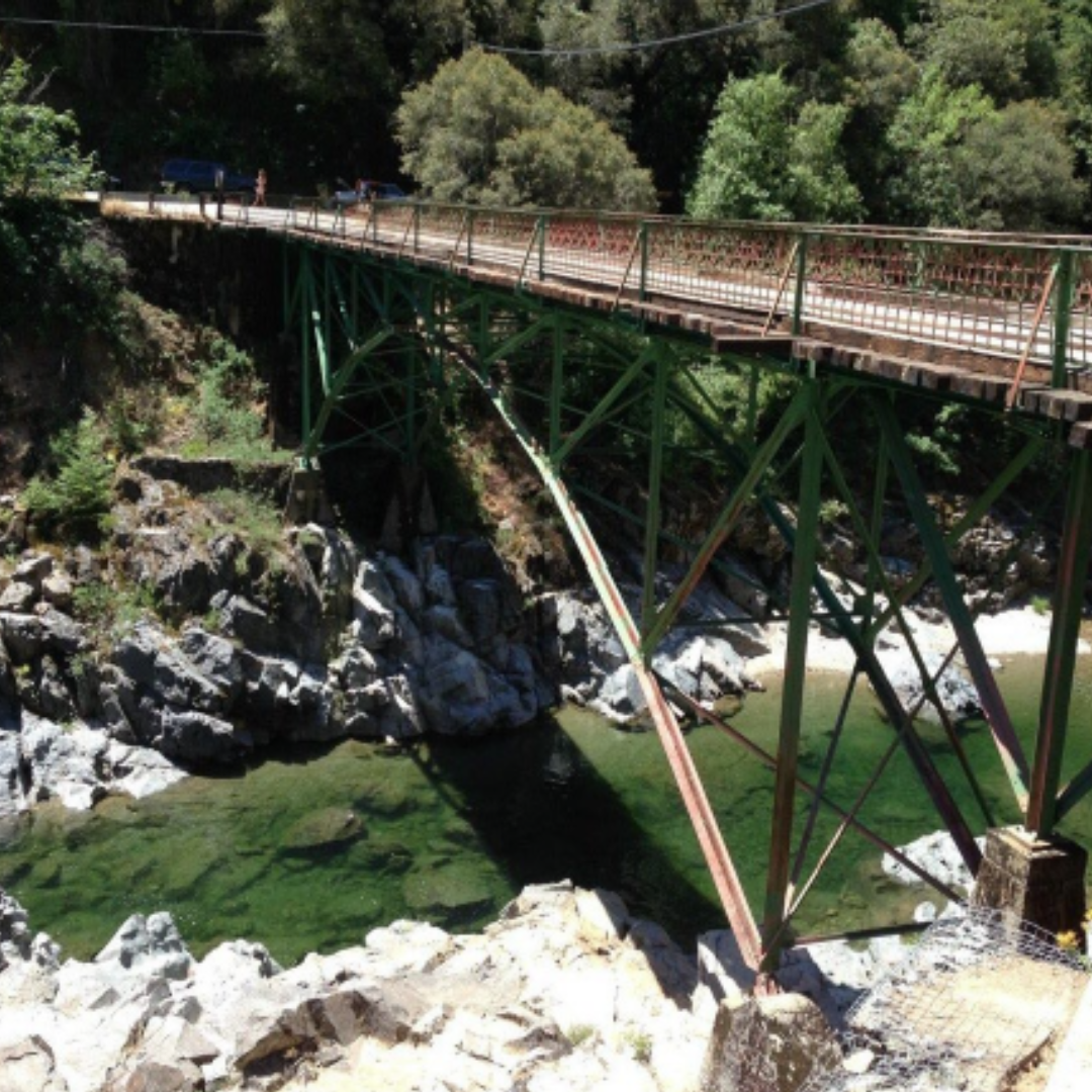 Edwards Crossing Bridge taken from bank of bridge to show the full arching bridge over S. Yuba River
