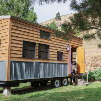 Tiny Home on Wheels Parked on Property