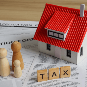 Three family members on top of application forms with the word 