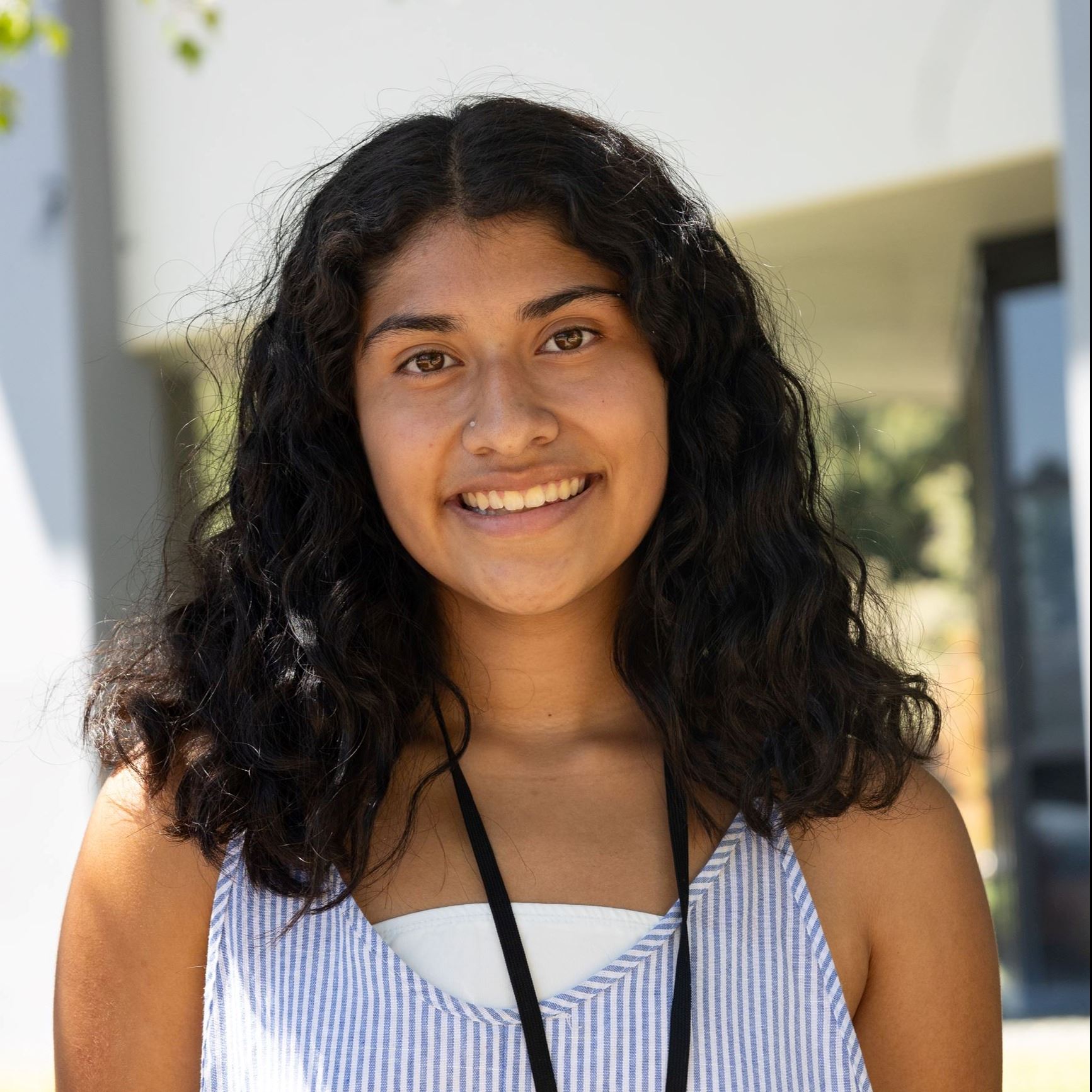2024 OES Intern in front of Rood Center